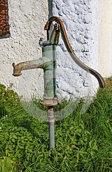 Old rusty handle faucet pump