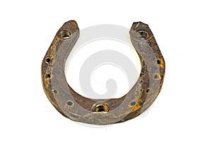 Old rusty horseshoe on a white background