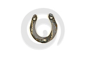 Old rusty horseshoe on a white background