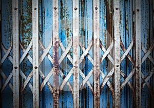 Old and rusty iron door background