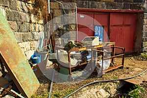 The old rusty iron table and chairs in outdoor