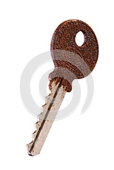 Old rusty key isolated on white background.