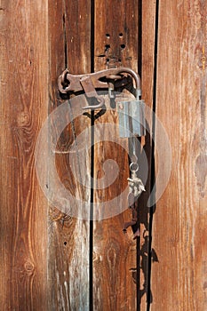 Old Rusty Latch on a Wooden Door