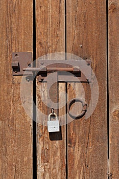 Old Rusty Latch on a Wooden Door