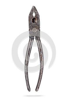 Old rusty lineman`s pliers isolated on white