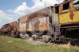 Old rusty locomotives and cars