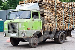 Old rusty lorry with pallets