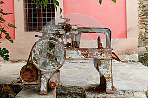 Old rusty machine located in a garden