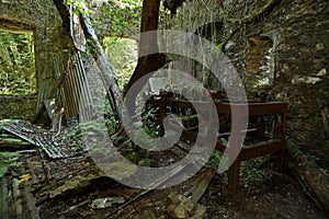 Old rusty machinery in the ancient abandoned mines of Calferro in the archaeological mining park of Mulina di Stazzema