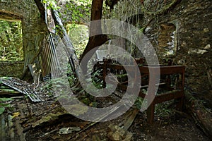 Old rusty machinery in the ancient abandoned mines of Calferro in the archaeological mining park of Mulina di Stazzema photo