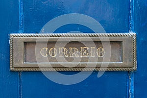 Old rusty mailbox with the word correio photo