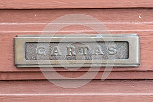 Old rusty mailbox with the word photo