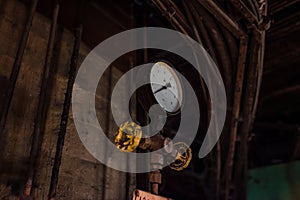 Old rusty manometer and valve