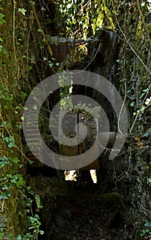 Old rusty mechanical gears in the abandoned mines of Calferro in the Mulina di Stazzema archaeological mining park, Tuscany. photo