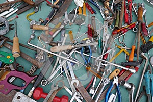 Jumble of old rusty hand tools