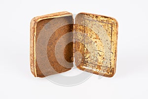 Old rusty metal box isolated on white background