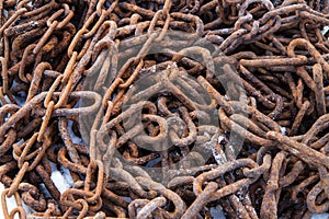 Old rusty metal chains.