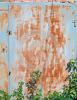 Old rusty metal garage door