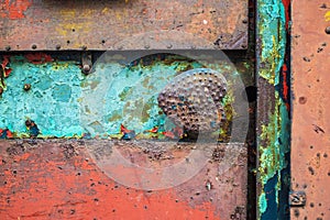 Old rusty metal iron door knob of an abandoned house