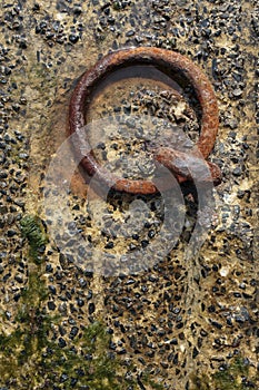 Old Rusty Metal Ring at the Harbor