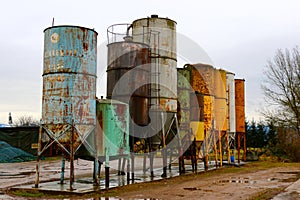 Old rusty metal silos