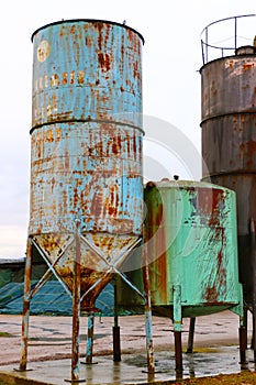 Old rusty metal silos