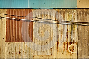 Old rusty metal wall building background