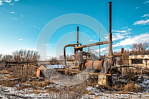 Old rusty mining and quarrying equipment, gravel crusher photo