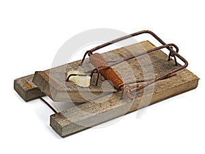 old rusty mousetrap with cheese bait isolated on white background