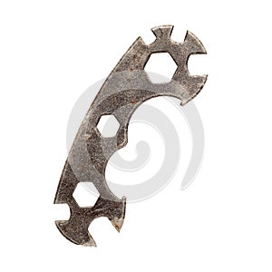 Old rusty multi function bicycle wrench hexagon.