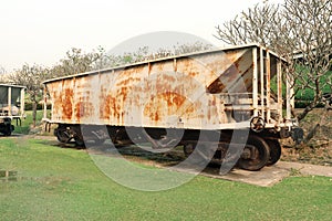 Old rusty out of order train of mining , Abandonned train on green garden