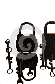 Old rusty padlocks and keys on white background. Mirror