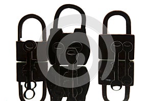 Old rusty padlocks and keys on white background. Mirror