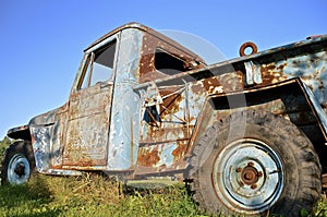 Old rusty pickup full of patina