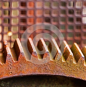 Old and rusty pinion gear of mechanical machine