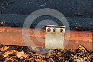 Old rusty pipe for hot water supply. Clamp for removing water leaks