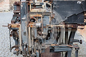 Old rusty printing machine complex mechanism of metal