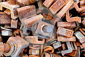 Old rusty rail treshold screws and nuts