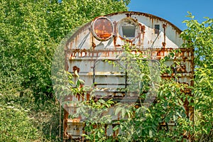 Old rusty railway wagon derelict.