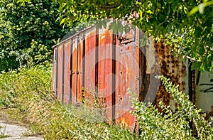 Old rusty railway wagon derelict abandoned in nature