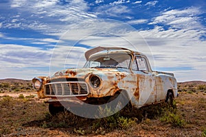 Old rusty relic car in Australian outback