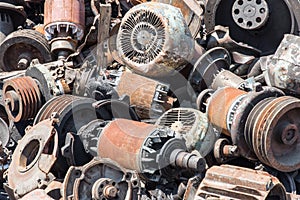 Old rusty rotors of electric generators photo