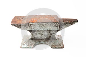 Old rusty rugged anvil foundry isolated white.