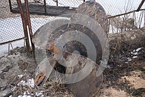 old rusty ship propeller in the trash heap