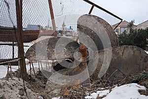 old rusty ship propeller in the trash heap