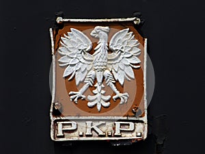 Old, rusty sign of polish railways PKP