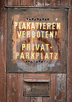 Old rusty sign for private parking space