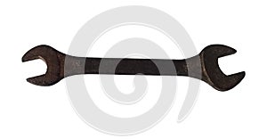 Old rusty spanner isolated on white background. Clipping path included