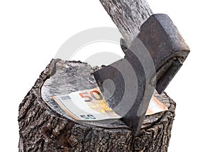 An old rusty splitting axe cutting 50 euro bank note concept