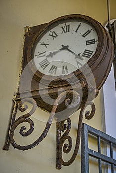 Old rusty station clock